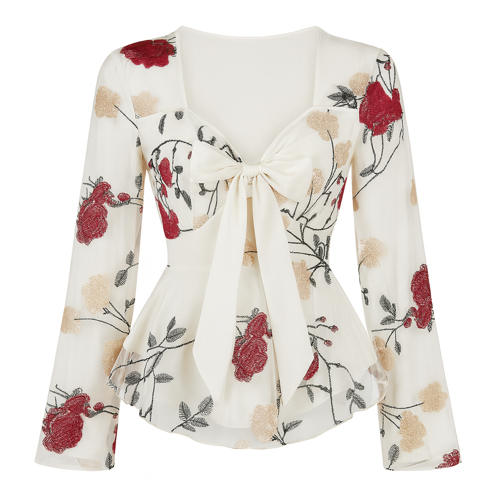 Long-sleeve sheer blouse with a fitted waist, front bow tie, and floral embroidery.