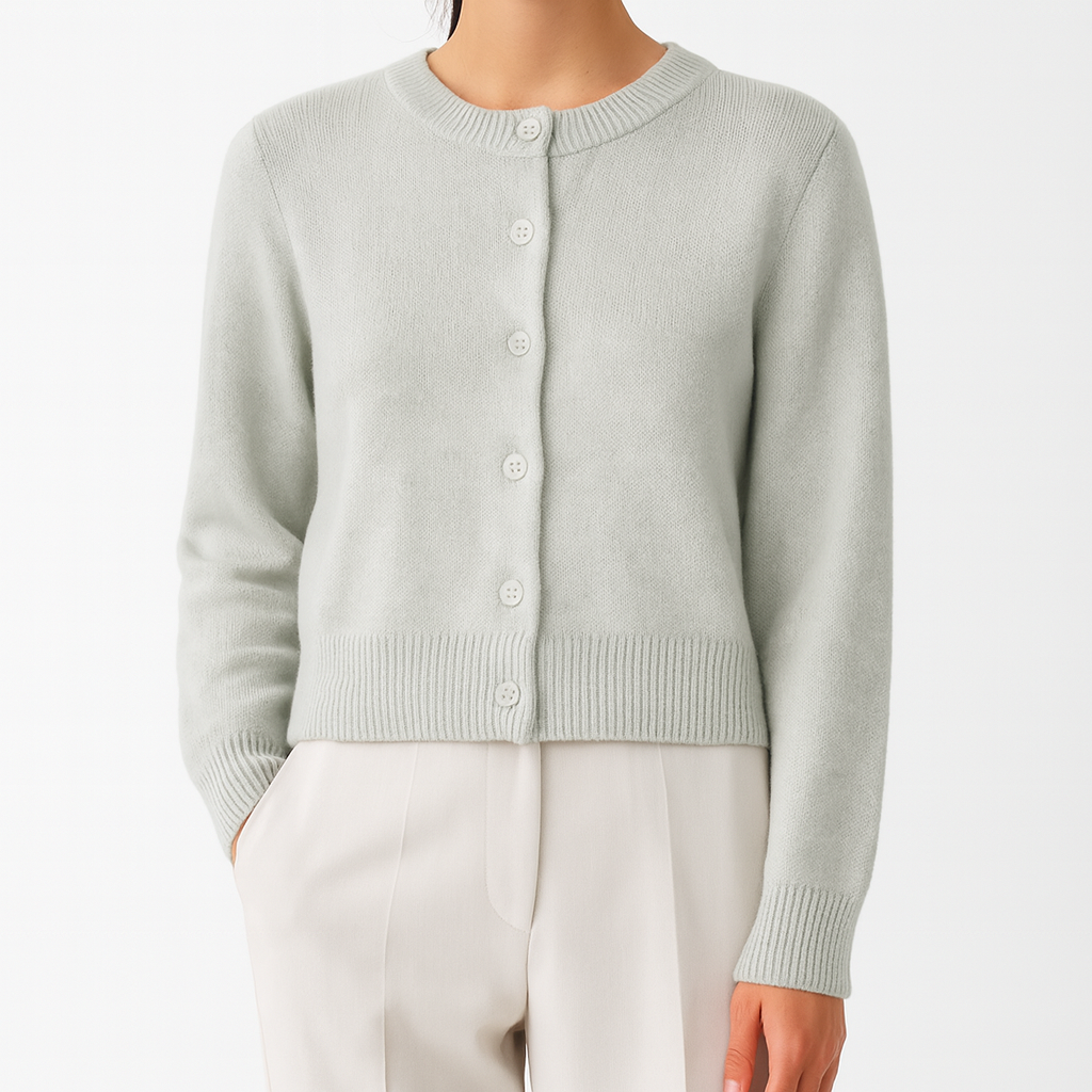 Long-sleeve knit cardigan with a crew neckline, front button closure, and ribbed cuffs and hem.