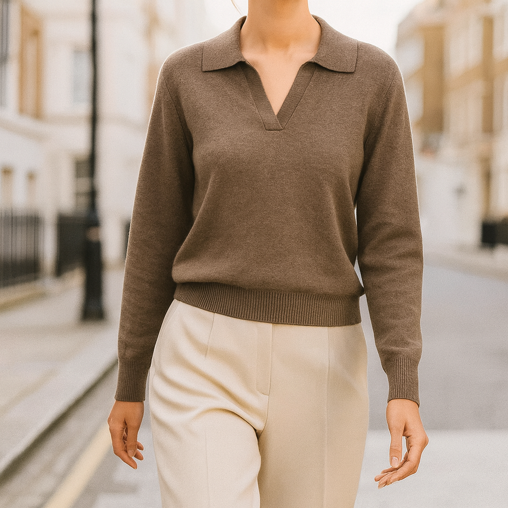 Long-sleeve knit top with a split collar neckline and ribbed cuffs and hem.