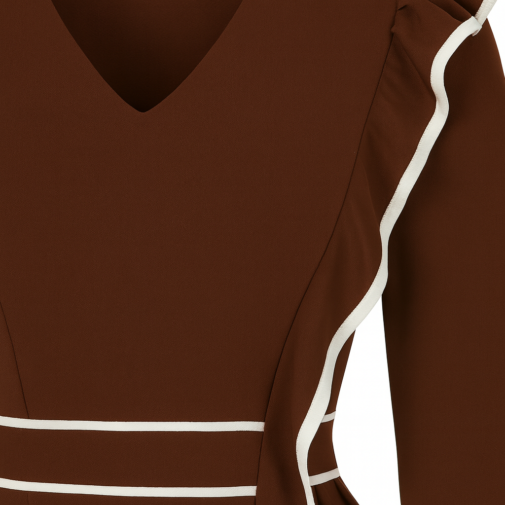 Long-sleeve blouse with a V-neckline, asymmetrical ruffle trim, fitted waist, and puffed cuffs.