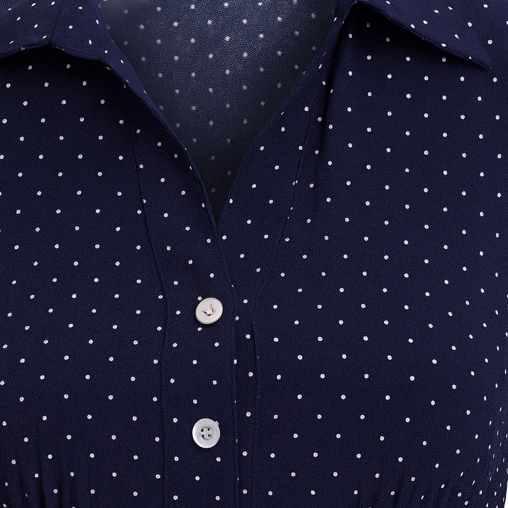 Long-sleeve fitted blouse with a collared neckline, button-down front, and flared cuffs.